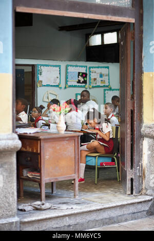 Teacher and school children in classroom, Havana, Cuba Stock Photo