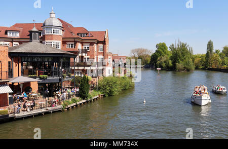 View down stream from Windsor and Eton Bridge over the River Thames in Windsor Royal Berkshire Stock Photo