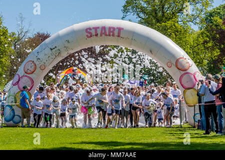 Charity fun Bubble Rush 5k for the East Anglian Childrens Hospice (EACH) in Norwich, 5th May 2018 Stock Photo