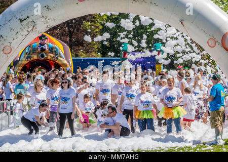 Charity fun Bubble Rush 5k for the East Anglian Childrens Hospice (EACH) in Norwich, 5th May 2018 Stock Photo