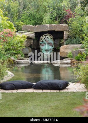 Malvern, Worcestershire, UK. Wednesday 9th May 2018 Malvern, Worcestershire, UK.  Show garden The Spirit of the Woods by Peter Dowle - Gold Medal and Best Construction awards.   Sculptures by Simon Gudgeon. Credit: Ian Thwaites/Alamy Live News Stock Photo