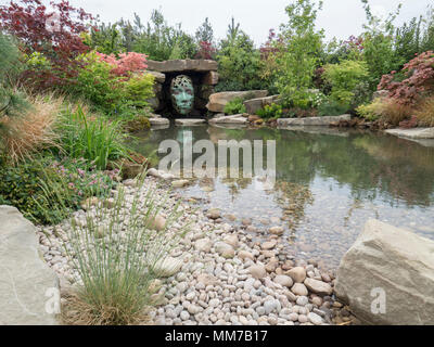 Malvern, Worcestershire, UK. Wednesday 9th May 2018 Malvern, Worcestershire, UK.  Show garden The Spirit of the Woods by Peter Dowle - Gold Medal and Best Construction awards.   Sculptures by Simon Gudgeon. Credit: Ian Thwaites/Alamy Live News Stock Photo