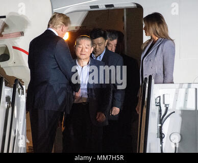 United States President Donald J. Trump welcomes Kim Dong Chul, Kim Hak Song and Tony Kim back to the US at Joint Base Andrews in Maryland on Thursday, May 10, 2018. The three men were imprisoned in North Korea for periods ranging from one and two years. They were released to US Secretary of State Mike Pompeo as a good-will gesture in the lead-up to the talks between President Trump and North Korean leader Kim Jong Un. Credit: Ron Sachs/CNP | usage worldwide Stock Photo