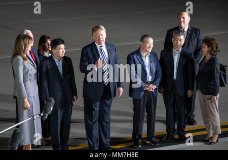 United States President Donald J. Trump makes remarks to the press as he welcomes Kim Dong Chul, Kim Hak Song and Tony Kim back to the US at Joint Base Andrews in Maryland on Thursday, May 10, 2018. The three men were imprisoned in North Korea for periods ranging from one and two years. They were released to US Secretary of State Mike Pompeo as a good-will gesture in the lead-up to the talks between President Trump and North Korean leader Kim Jong Un. Credit: Ron Sachs/CNP | usage worldwide Stock Photo