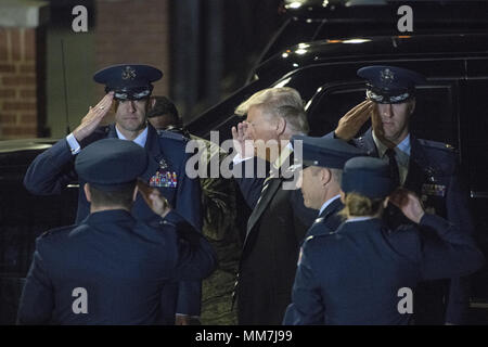 Joiunt Base Andrews, Maryland, USA. 9th May, 2018. United States President Donald J. Trump exchanges salutes with officers as he prepares to welcome Kim Dong Chul, Kim Hak Song and Tony Kim back to the US at Joint Base Andrews in Maryland on Thursday, May 10, 2018. The three men were imprisoned in North Korea for periods ranging from one and two years. They were released to US Secretary of State Mike Pompeo as a good-will gesture in the lead-up to the talks between President Trump and North Korean leader Kim Jong Un.Credit: Ron Sachs/CNP (Credit Image: © Ron Sachs/CNP Stock Photo