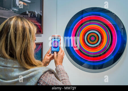 Hampstead, London, UK. 9th May, 2018. Targets by Franco Defrancesca - The Affordable Art Fair opens in Hampstead and runs until 14 May. The fair offers visitors a chance to purchase work from over 110 galleries at prices between £100 and £6,000 Credit: Guy Bell/Alamy Live News Stock Photo