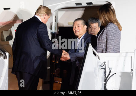 President Donald Trump and his wife Melania welcoming the three American detainees (Kim Dong-chul, Kim Hak-song, and Tony Kim) held in captivity in North Korea at Joint Base Andrews in Suitland.