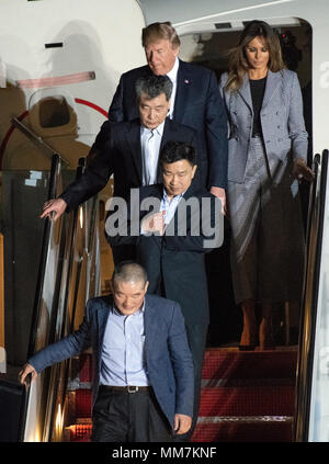 United States President Donald J. Trump welcomes Kim Dong Chul, Kim Hak Song and Tony Kim back to the US at Joint Base Andrews in Maryland on Thursday, May 10, 2018. The three men were imprisoned in North Korea for periods ranging from one and two years. They were released to US Secretary of State Mike Pompeo as a good-will gesture in the lead-up to the talks between President Trump and North Korean leader Kim Jong Un. Credit: Ron Sachs/CNP /MediaPunch Stock Photo