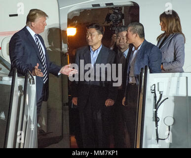 United States President Donald J. Trump welcomes Kim Dong Chul, Kim Hak Song and Tony Kim back to the US at Joint Base Andrews in Maryland on Thursday, May 10, 2018. The three men were imprisoned in North Korea for periods ranging from one and two years. They were released to US Secretary of State Mike Pompeo as a good-will gesture in the lead-up to the talks between President Trump and North Korean leader Kim Jong Un. Credit: Ron Sachs/CNP /MediaPunch Stock Photo