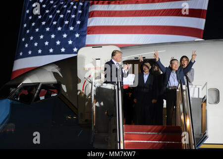 U.S. President Donald Trump and First Lady Melania Trump welcome home three American detainees freed by North Korea on arrival at Joint Base Andrews May 10, 2018 in Clinton, Maryland. The three include Kim Dong-chul, Tony Kim and Kim Hak-song released as a gesture of goodwill ahead of the planned meeting between Trump and North Korean leader Kim Jong-un.