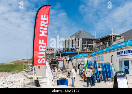 A colourful banner advertising surf hire at Fistral beach in Newquay in Cornwall. Stock Photo