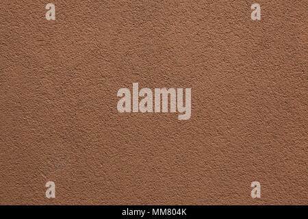 Brown painted stucco wall. Background texture. Stock Photo