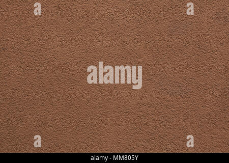 Brown painted stucco wall. Background texture. Stock Photo
