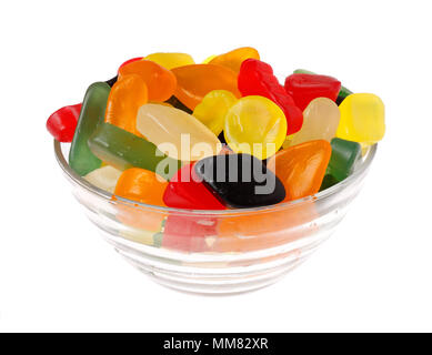 Colorful winegums in a glass bowl isolated on white background. Stock Photo