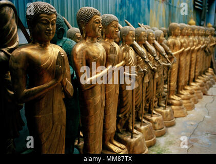 Thai Buddhism - Buddha statue art for sale in Bamrung Muang Road in Bangkok in Thailand in Southeast Asia Far East. Serenity Serene Buddhist Travel Stock Photo