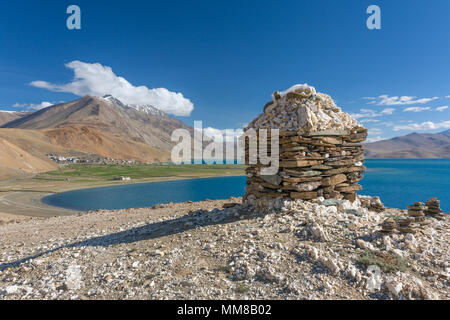 Simple Buddhist stone stupa near the Karzok village and Tso Moriri Lake located in Rupshu valley in Ladakh, India Stock Photo