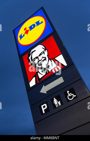 09 May 2018 - New-build KFC with Drive Thru and Lidl Store at Crosfield's Roundabout, Warrington, Cheshire, England, UK Stock Photo