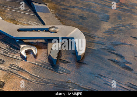 Two wrenches on wood Stock Photo