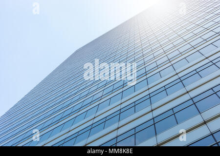 Perspective and underside angle view to textured background of modern glass building skyscrapers Stock Photo