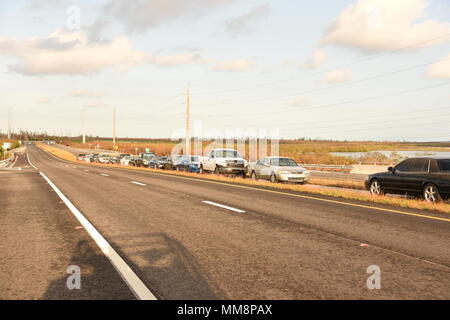 Abandoned cars litter the interstate to Key West, Sept. 14, 2017. U.S. Coast Guard photo by Petty Officer 2nd Class Dustin R. Williams Stock Photo