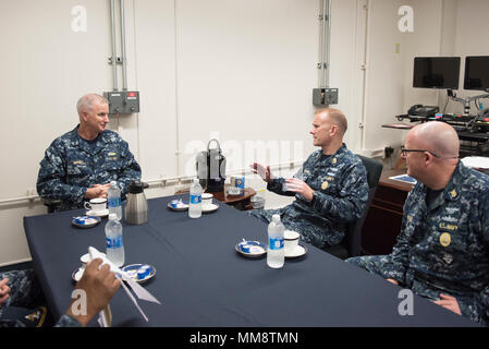 170913-N-MD297-057  YOKOSUKA, Japan (Sept. 13, 2017) Master Chief Petty Officer of the Navy (MCPON) Steven S. Giordano speaks with Rear Adm. Gregory Fenton, commander, Navy Region Japan during an office call in Yokosuka, Japan. Giordano and his wife, Navy Ombudsman-at-Large Elka Franco-Giordano, are on a tour of the U.S. 7th Fleet area of responsibility. (U.S. Navy photo by Mass Communication Specialist 2nd Class Huey D. Younger Jr./Released) Stock Photo