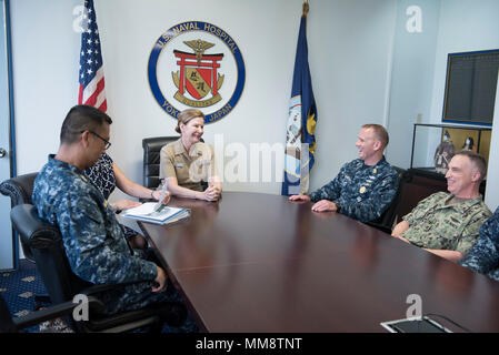 170913-N-MD297-125  YOKOSUKA, Japan (Sept. 13, 2017) Master Chief Petty Officer of the Navy (MCPON) Steven S. Giordano speaks with Capt. Rosemary C. Malone, commanding officer of U.S. Naval Hospital Yokosuka, during an office call in Yokosuka, Japan. Giordano and his wife, Navy Ombudsman-at-Large Elka Franco-Giordano, are on a tour of the U.S. 7th Fleet area of responsibility. (U.S. Navy photo by Mass Communication Specialist 2nd Class Huey D. Younger Jr./Released) Stock Photo