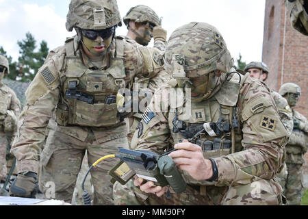 U.S. Army Cpt. Mark Buhl, left, commander, Company B, 1st Battalion ...