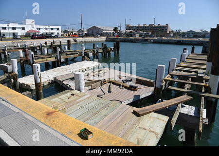 Several wooden piers severely damaged by Hurricane Irma, Sept. 18, 2017. Damage to the sector has been tirelessly assessed and repaired by members of Sector Key West engineering. U.S. Coast Guard photo by Petty Officer 2nd Class Dustin R. Williams Stock Photo