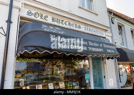 Sole Butchers, a traditional butcher and game shop in Broad Street, New Alresford, a small town or village in Hampshire, southern England, UK Stock Photo