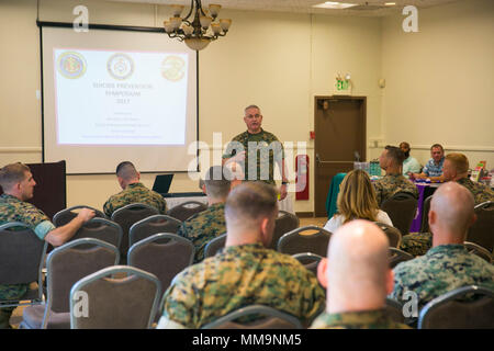 Col. Ricardo Martinez, chief of staff, speaks at the Suicide Prevention Symposium, held aboard the Combat Center, September 19, 2017. The symposium,  organized by the behavioral health branch of Marine Corps Community Services, provided Combat Center leadership with information and resources to aid in dealing with mental health and suicide prevention. (U.S. Marine Corps photo by Lance Cpl. Isaac Cantrell) Stock Photo