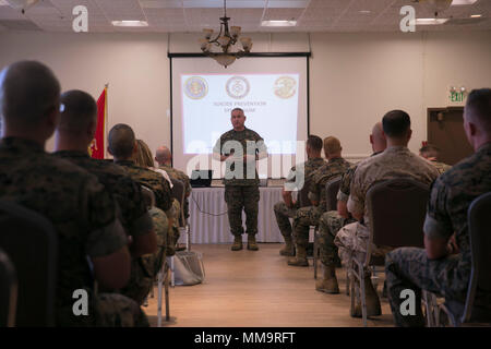 Col. Ricardo Martinez, chief of staff, speaks at the Suicide Prevention Symposium, held aboard the Combat Center, September 19, 2017. The symposium,  organized by the behavioral health branch of Marine Corps Community Services, provided Combat Center leadership with information and resources to aid in dealing with mental health and suicide prevention. (U.S. Marine Corps photo by Lance Cpl. Isaac Cantrell) Stock Photo