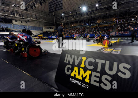 Team U.S. plays against Team Ontario in wheelchair rugby during the 2017 Invictus Games at the Mattamy Athlethics Centre in Toronto, Canada, September 27, 2017. The Invictus Games are the sole international adaptive sporting event for injured active duty and veteran service members. (U.S. Air Force photo/ Staff Sgt. Jannelle McRae) Stock Photo