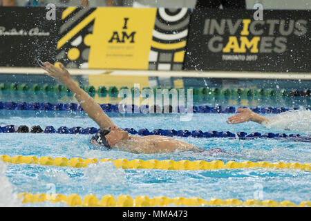 Athletes compete in Swimming heats during the 2017 Invictus Games at the Toronto Pan Am Sports Centre in Toronto on September 28, 2017. The Invictus Games, established by Prince Harry in 2014, brings together wounded and injured veterans from 17 nations for 12 adaptive sporting events, including track and field, wheelchair basketball, wheelchair rugby, swimming, sitting volleyball, and new to the 2017 games, golf.    (DoD photo by Roger L. Wollenberg) Stock Photo