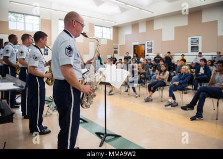 Members of the U.S. Air Force Band’s Airmen of Note assigned to Joint Base Anacostia-Bolling in Washington, D.C., put on a clinic with over 200 students from El Cerrito High School, El Cerrito Calif., Oct. 2, 2017. The group of 18 active duty musicians, including a vocalist, visited the area as part of their fall tour and educational outreach program. (U.S. Air Force photo by Louis Briscese) Stock Photo