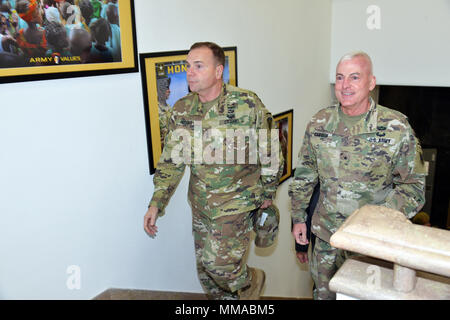 Brig. Gen. Eugene J. LeBoeuf (right), acting Commander of U.S. Army Africa, walks to his office with Lt. Gen. Ben Hodges (left), Commanding General of U.S. Army Europe, during a recent visit to Caserma Ederle, Vicenza, Italy Oct. 4, 2017. (Photo by U.S. Army Visual Information Specialist Davide Dalla Massara/Released) Stock Photo