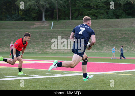 A Royal Sailor assigned to the Royal Navy Rugby Team participates in an exhibition game between the All Marine Rugby Team and Royal Navy Rugby Team at Butler Stadium on Marine Corps Base Quantico, Va., Sept. 20, 2017. The match was a part of the Royal Navy Rugby Union Senior XV Tour, which consisted of matches against the United States Naval Academy and the Potomac Rugby Club. (U.S. Marine Corps photo by Lance Cpl. Cristian L. Ricardo) Stock Photo