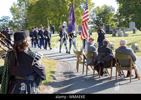 A New York Army National Guard Color Guard and members of the official party approach the grave of Chester A. Arthur, president of the United States from 1881 to 1885 during a ceremony at Albany Rural Cemetery in Menands, N.Y. on Oct. 5, 2017. The United States Military honors deceased presidents with a wreath from the sitting president at their gravesite on the anniversary of the past president's birth. ( New York State Division of Military and Naval Affairs photo by William Albrecht) Stock Photo