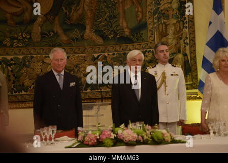 Athens, Greece. 09th May, 2018. Charles, Prince of Wales (left), and the President of Hellenic Republic Prokopis Pavlopoulos (right) listening the national anthemes, during the official dinner. Credit: Dimitrios Karvountzis/Pacific Press/Alamy Live News Stock Photo