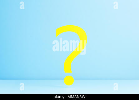 Question mark over blue background Stock Photo