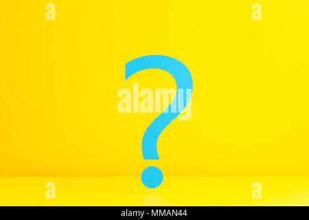 Question mark over yellow background Stock Photo