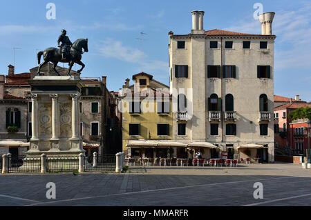 Campo Santi Giovanni e Paolo at sunrise, showing the Equestrian Statue of Bartolomeo Colleoni at left, Venice, Italy Stock Photo