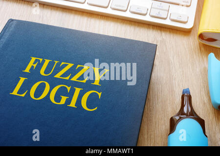 Book about fuzzy logic on a table. Stock Photo