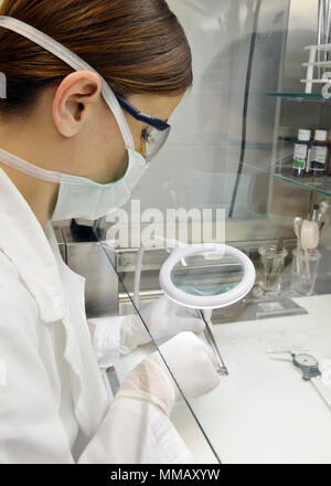 Pathologist Examining a Tumor in a Hospital Laboratory Stock Photo