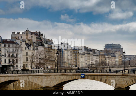 Pont de l'Archevêché looking towards the buildings and apartments on  Île Saint-Louis,Paris ,France Stock Photo