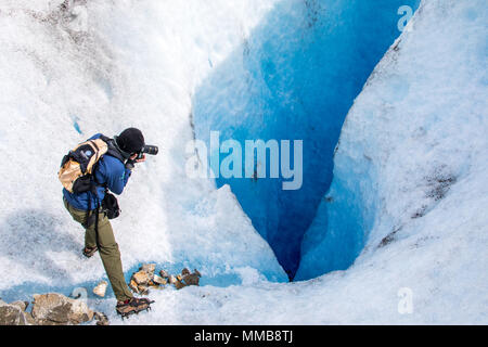 Tourists taking photos, Hielo Y Aventura Big Ice Tour, Perito Moreno Glacier, Glaciar Perito Moreno, Argentina