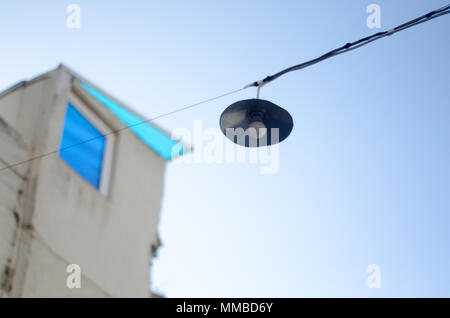 hanging vintage lamp blue sky background Stock Photo