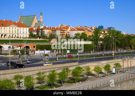 Warsaw, Mazovia / Poland - 2018/04/22: Panoramic view of historic quarter of Warsaw with Royal Castle and old town tenements seen from the Vistula riv Stock Photo