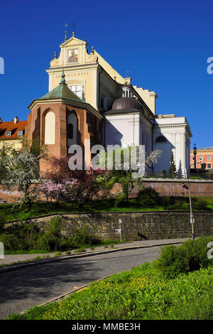 Warsaw, Mazovia / Poland - 2018/04/22: Historic quarter of Warsaw old town - St. Anne Church at Krakowskie Przedmiescie street Stock Photo