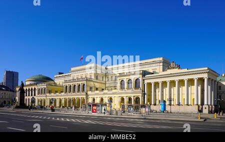 Warsaw, Mazovia / Poland - 2018/04/22: Historic building of Treasury Ministry Palace as part of Warsaw City Hall with Juliusz Slowacki monument in cit Stock Photo