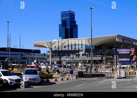 Warsaw, Masovia / Poland - 2018/04/22: Warsaw Central railway station and modern skyscrapers in Warsaw city center at Jerozolimskie Avenue Stock Photo